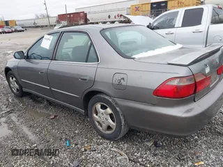 2000 Honda Accord EX z VIN 1HGCG5658YA142693, wystawiony jako IAAI lot #41618554 z przebiegiem 302 381 mil mil oraz . Historia ofert i sprzedaży dostępna na DreamBid. Obrazek 3.