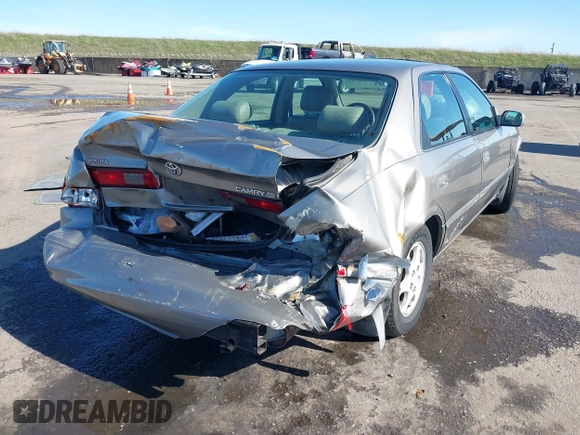 1998 Toyota Camry LE z VIN 4T1BG28KXWU248887, wystawiony jako IAAI lot #41507392 z przebiegiem Nie podano mil oraz . Historia ofert i sprzedaży dostępna na DreamBid. Obrazek 6.