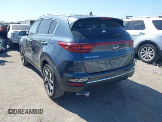 2021 Kia Sportage EX with VIN KNDPN3AC1M7889706, listed as a IAAI auction lot 41948559 with 52,329 mi miles and . Bid and sale history available at DreamBid. Image 3.