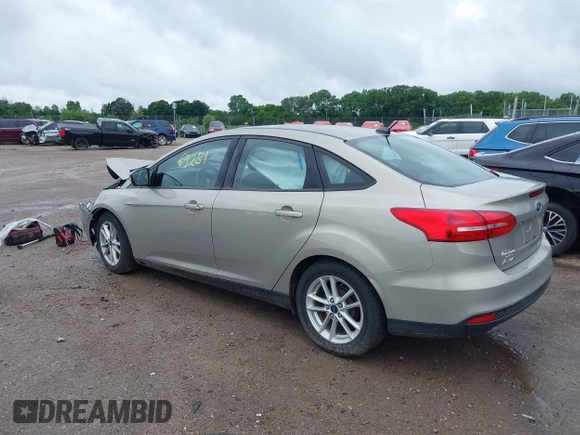 2016 Ford Focus SE z VIN 1FADP3F28GL300925, wystawiony jako IAAI lot #42563251 z przebiegiem 93 247 mil mil oraz . Historia ofert i sprzedaży dostępna na DreamBid. Obrazek 3.