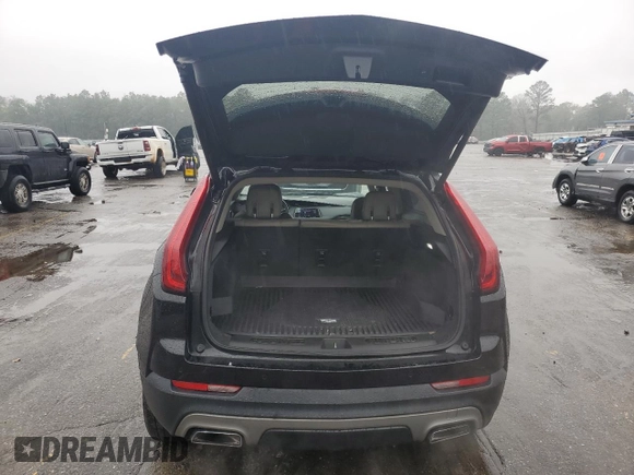 2019 Cadillac XT4 FWD Premium Luxury with VIN 1GYFZCR47KF152164, listed as a Copart auction lot 44705115 with 99,115 mi miles and Salvage Title. Bid and sale history available at carsss.com. Image 6.