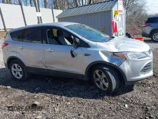 2014 Ford Escape SE with VIN 1FMCU9GX5EUD36442, listed as a IAAI auction lot 41984241 with 105,423 mi miles. Bid and sale history available at carsss.com. Image 13.