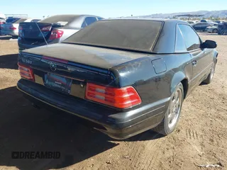 1999 Mercedes-Benz SL-Class with VIN WDBFA68F6XF181713, listed as a IAAI auction lot 41337468 with 122,034 mi miles. Bid and sale history available at carsss.com. Image 4.