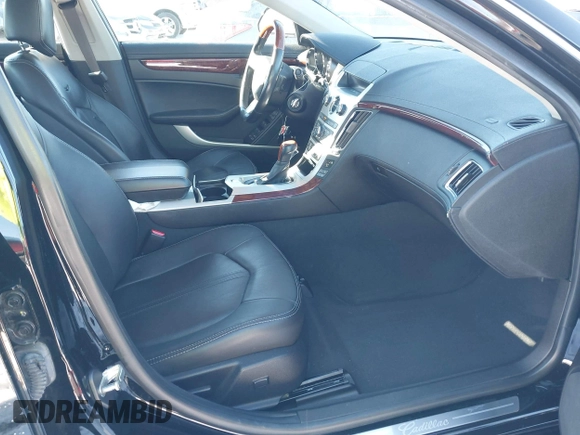 2013 Cadillac CTS Premium z VIN 1G6DS5E34D0160676, wystawiony jako IAAI lot #41262795 z przebiegiem 122 248 mil mil oraz . Historia ofert i sprzedaży dostępna na DreamBid. Obrazek 5.
