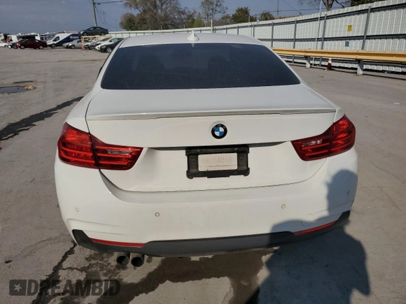 2015 BMW 4 Series 428i xDrive with VIN WBA3N5C5XFK197692, listed as a Copart auction lot 77219684 with 96,148 mi miles and Salvage title. Bid and sale history available at DreamBid. Image 6.