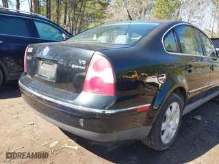 2003 Volkswagen Passat GLX with VIN WVWTH63B43P299509, listed as a IAAI auction lot 41775005 with 137,271 mi miles. Bid and sale history available at carsss.com. Image 6.