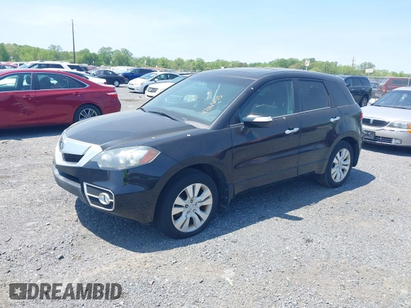 2011 Acura RDX with VIN 5J8TB2H23BA001442, listed as a IAAI auction lot 42165155 with 202,951 mi miles. Bid and sale history available at carsss.com. Image 2.