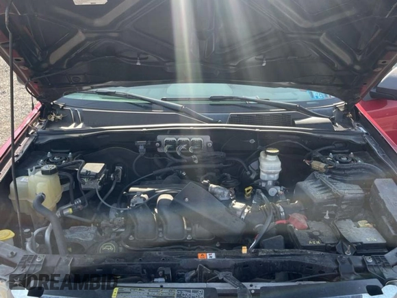 2008 Ford Escape XLT with VIN 1FMCU931X8KD40679, listed as a Copart auction lot 58637585 with 135,391 mi miles and Clean title. Bid and sale history available at DreamBid. Image 7.
