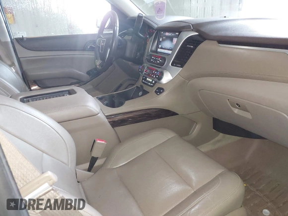 2015 GMC Yukon XL SLT with VIN 1GKS2HKC6FR667110, listed as a IAAI auction lot 41472250 with 141,383 mi miles. Bid and sale history available at carsss.com. Image 5.