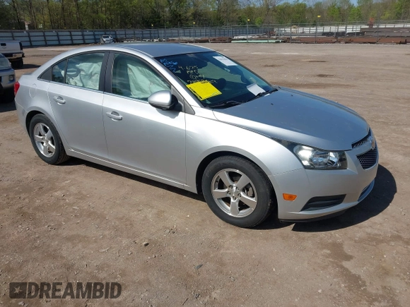 2014 Chevrolet Cruze 1LT with VIN 1G1PC5SBXE7320337, listed as a IAAI auction lot 42010404 with 69,270 mi miles and . Bid and sale history available at DreamBid. Image 1.