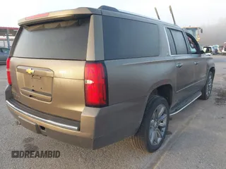 2016 Chevrolet Suburban LTZ with VIN 1GNSCJKC0GR173690, listed as a IAAI auction lot 41780251 with 125,603 mi miles and . Bid and sale history available at DreamBid. Image 4.