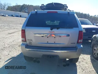 2009 Jeep Grand Cherokee with VIN 1J8HR68T39C540795, listed as a IAAI auction lot 41379112 with 236,624 mi miles and . Bid and sale history available at DreamBid. Image 16.