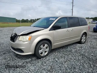 2013 Dodge Grand Caravan SE with VIN 2C4RDGBG2DR791593, listed as a Copart auction lot 51997165 with 84,959 mi miles and Salvage Title. Bid and sale history available at DreamBid. Image 1.