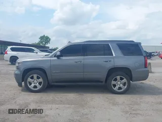 2019 Chevrolet Tahoe LT z VIN 1GNSCBKC8KR406519, wystawiony jako IAAI lot #42145021 z przebiegiem 74 694 mil mil oraz . Historia ofert i sprzedaży dostępna na DreamBid. Obrazek 14.
