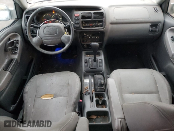 2002 Chevrolet Tracker LT z VIN 2CNBJ634526917089, wystawiony jako Copart lot #79265434 z przebiegiem 131 081 mil mil oraz Czysty tytuł • Clean title. Historia ofert i sprzedaży dostępna na DreamBid. Obrazek 8.