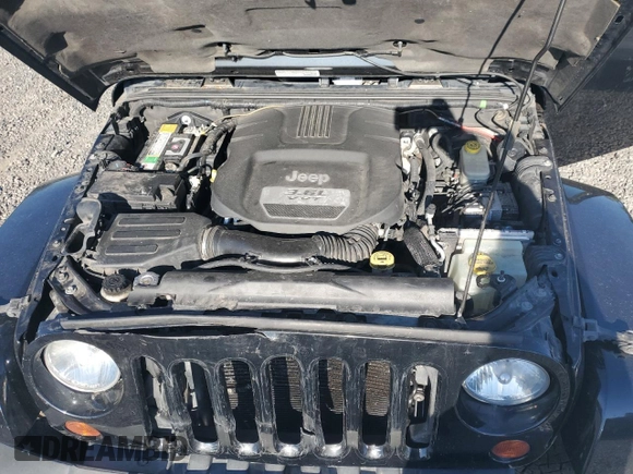 2013 Jeep Wrangler Unlimited Rubicon z VIN 1C4HJWFG6DL557085, wystawiony jako Copart lot #55491775 z przebiegiem 139 240 mil mil oraz Szkoda całkowita • Salvage title. Historia ofert i sprzedaży dostępna na DreamBid. Obrazek 12.