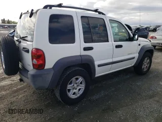 2002 Jeep Liberty Sport with VIN 1J4GL48K92W351230, listed as a Copart auction lot 51274195 with 211,716 mi miles and Salvage Title. Bid and sale history available at carsss.com. Image 3.