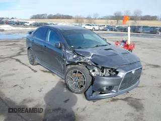 2009 Mitsubishi Lancer with VIN JA3AV66V19U035047, listed as a IAAI auction lot 41591612 with 113,119 mi miles and . Bid and sale history available at DreamBid. Image 12.