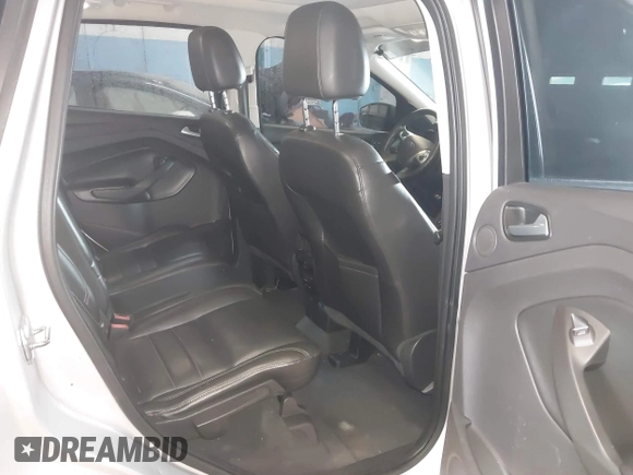 2015 Ford Escape Titanium z VIN 1FMCU9J96FUB23902, wystawiony jako IAAI lot #42497188 z przebiegiem 164 452 mil mil oraz . Historia ofert i sprzedaży dostępna na DreamBid. Obrazek 8.