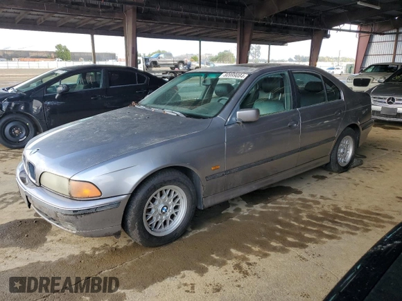 1997 BMW 5 Series 528iA with VIN WBADD6327VBW21086, listed as a Copart auction lot 80999084 with 170,865 mi miles and Clean Title. Bid and sale history available at carsss.com. Image 1.