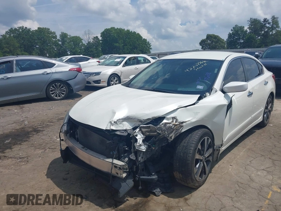 2016 Nissan Altima SR with VIN 1N4AL3AP7GC219688, listed as a IAAI auction lot 42267866 with 110,786 mi miles and . Bid and sale history available at DreamBid. Image 17.