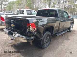 2014 Chevrolet Silverado 1500 LT with VIN 1GCVKREC4EZ110415, listed as a IAAI auction lot 41711383 with 100,344 mi miles and . Bid and sale history available at DreamBid. Image 4.