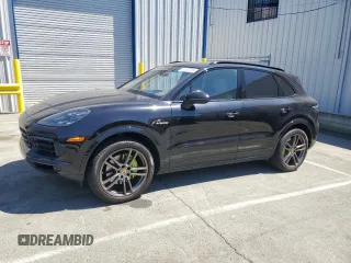 2019 Porsche Cayenne E-Hybrid with VIN WP1AE2AYXKDA52087, listed as a Copart auction lot 62587465 with 58,009 mi miles and Salvage title. Bid and sale history available at DreamBid. Image 1.