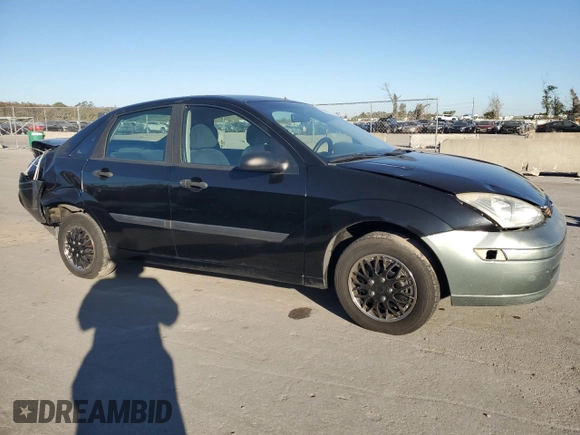 2000 Ford Focus LX with VIN 1FAFP33P8YW216936, listed as a Copart auction lot 83038404 with 120,298 mi miles and Salvage Title. Bid and sale history available at DreamBid. Image 4.