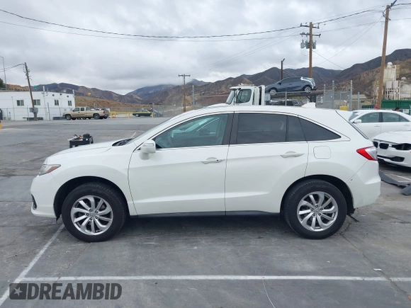 2018 Acura RDX with VIN 5J8TB3H31JL012439, listed as a IAAI auction lot 41565530 with 63,909 mi miles and . Bid and sale history available at DreamBid. Image 14.