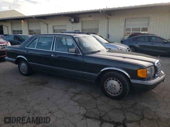 1991 Mercedes-Benz 560 with VIN WDBCA39E8MA567307, listed as a Copart auction lot 77488244 with 202,305 mi miles and Clean Title. Bid and sale history available at DreamBid. Image 4.