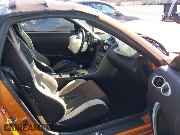 2004 Nissan 350Z Touring z VIN JN1AZ36A24T000472, wystawiony jako IAAI lot #38684053 z przebiegiem 65 769 mil mil oraz . Historia ofert i sprzedaży dostępna na DreamBid. Obrazek 5.