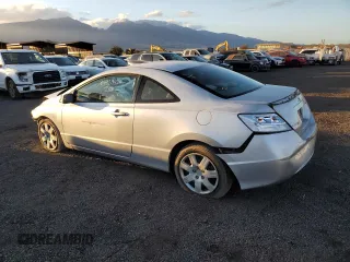2010 Honda Civic Cpe LX with VIN 2HGFG1B63AH514226, listed as a Copart auction lot 84969424 with 115,520 mi miles and Salvage Title. Bid and sale history available at carsss.com. Image 2.