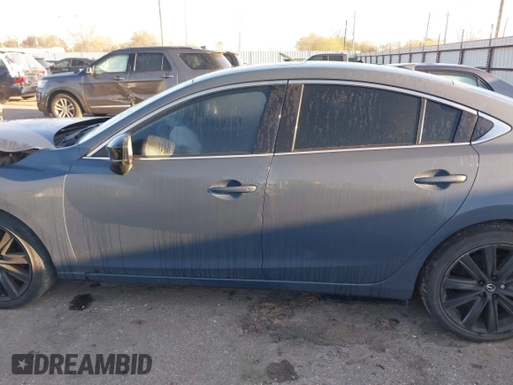 2021 Mazda 6 Carbon Edition with VIN JM1GL1WY9M1619981, listed as a IAAI auction lot 41751194 with 32,083 mi miles and . Bid and sale history available at DreamBid. Image 14.