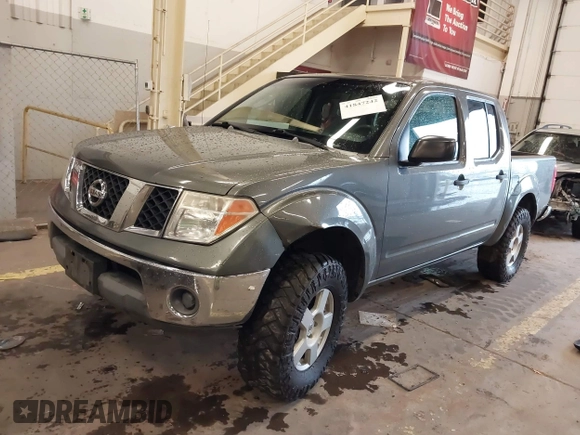 2005 Nissan Frontier 4WD LE with VIN 1N6AD07W95C411421, listed as a IAAI auction lot 41847242 with 209,816 mi miles. Bid and sale history available at carsss.com. Image 2.