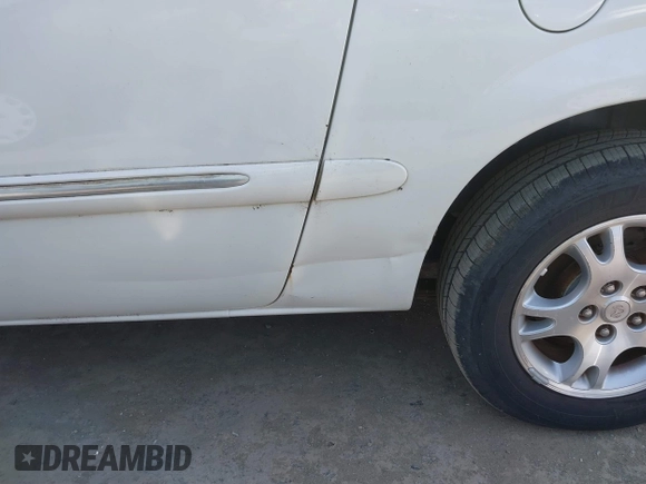 2001 Dodge Grand Caravan with VIN 2B4GT54L51R297228, listed as a IAAI auction lot 41764303 with 186,482 mi miles and . Bid and sale history available at DreamBid. Image 6.