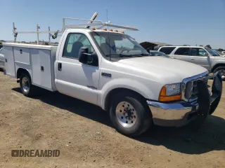 1999 Ford F-350 XL with VIN 1FDSF34F4XED15884, listed as a Copart auction lot 65783674 with 306,850 mi miles and Clean Title. Bid and sale history available at DreamBid. Image 4.