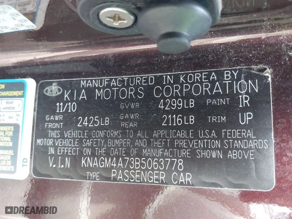 2011 Kia Optima LX with VIN KNAGM4A73B5063778, listed as a IAAI auction lot 39932051 with 143,175 mi miles. Bid and sale history available at carsss.com. Image 9.
