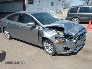 2020 Ford Fusion SE z VIN 3FA6P0HD9LR231471, wystawiony jako IAAI lot #41986473 z przebiegiem 58 587 mil mil oraz . Historia ofert i sprzedaży dostępna na DreamBid. Obrazek 1.