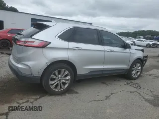 2019 Ford Edge Titanium с VIN 2FMPK3K95KBB22694, выставлен на аукционе Copart как лот 58660475 с пробегом 144 615 миль миль и Списание • Salvage title. История ставок и продаж доступна на DreamBid. Изображение 3.
