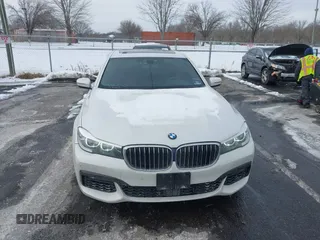 2018 BMW 7 Series 740i xDrive with VIN WBA7E4C59JGV23876, listed as a IAAI auction lot 41381398 with 106,675 mi miles. Bid and sale history available at carsss.com. Image 12.