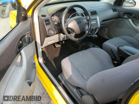 2006 Ford Focus S z VIN 1FAHP31N06W222169, wystawiony jako Copart lot #60300995 z przebiegiem 128 734 mil mil oraz Szkoda całkowita • Salvage title. Historia ofert i sprzedaży dostępna na DreamBid. Obrazek 8.