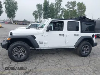 2021 Jeep Wrangler Unlimited Sport Altitude with VIN 1C4HJXDN5MW644613, listed as a IAAI auction lot 42466188 with 63,959 mi miles and . Bid and sale history available at DreamBid. Image 14.