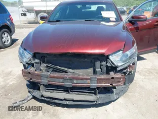 2016 Ford Taurus SEL z VIN 1FAHP2H8XGG136549, wystawiony jako IAAI lot #42338455 z przebiegiem 170 123 mil mil oraz . Historia ofert i sprzedaży dostępna na DreamBid. Obrazek 6.