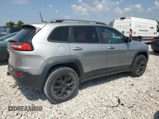 2016 Jeep Cherokee Trailhawk with VIN 1C4PJMBS4GW353088, listed as a Copart auction lot 62275145 with 129,758 mi miles and Clean title. Bid and sale history available at DreamBid. Image 3.