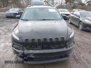 2017 Jeep Cherokee Altitude with VIN 1C4PJLAS7HW610189, listed as a IAAI auction lot 41670339 with 116,556 mi miles and . Bid and sale history available at DreamBid. Image 12.