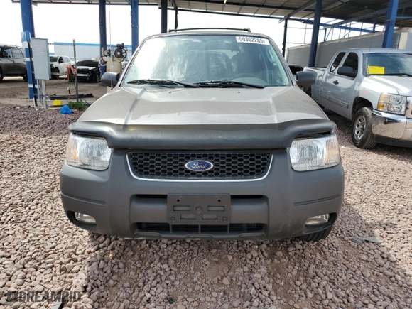 2003 Ford Escape XLT Popular with VIN 1FMYU03103KC43310, listed as a Copart auction lot 50362285 with 69,308 mi miles and Salvage Title. Bid and sale history available at carsss.com. Image 5.