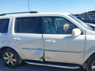2012 Honda Pilot Touring with VIN 5FNYF3H91CB020673, listed as a IAAI auction lot 41721836 with 123,607 mi miles and . Bid and sale history available at carsss.com. Image 13.