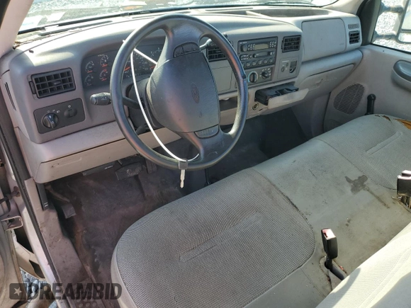 2001 Ford F-250 XL with VIN 1FTNF21L11EC49565, listed as a Copart auction lot 57776185 with 110,842 mi miles and Salvage title. Bid and sale history available at DreamBid. Image 8.
