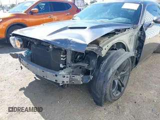 2017 Dodge Challenger R/T Plus with VIN 2C3CDZBT8HH600032, listed as a IAAI auction lot 42173591 with 92,303 mi miles and . Bid and sale history available at DreamBid. Image 6.