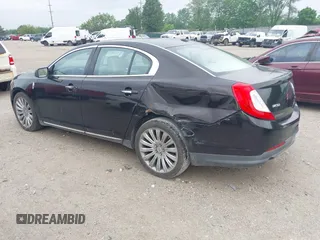 2013 Lincoln MKS z VIN 1LNHL9EK0DG600129, wystawiony jako IAAI lot #42314913 z przebiegiem 119 674 mil mil oraz . Historia ofert i sprzedaży dostępna na DreamBid. Obrazek 3.